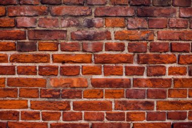 Kırmızı antika tuğlalar duvar arkası. Eski bina yüzeyi