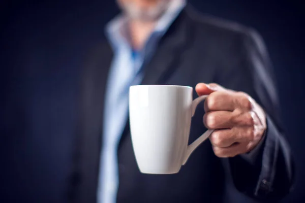Businessman Suit Holding Cup Tea Coffee Hand Front Black Background — Stockfoto