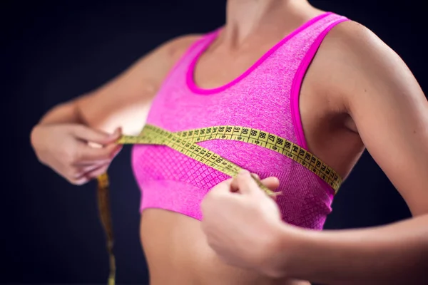 Woman Pink Top Measuring Her Chest Yellow Meter Fitness Lifestyle — Fotografia de Stock