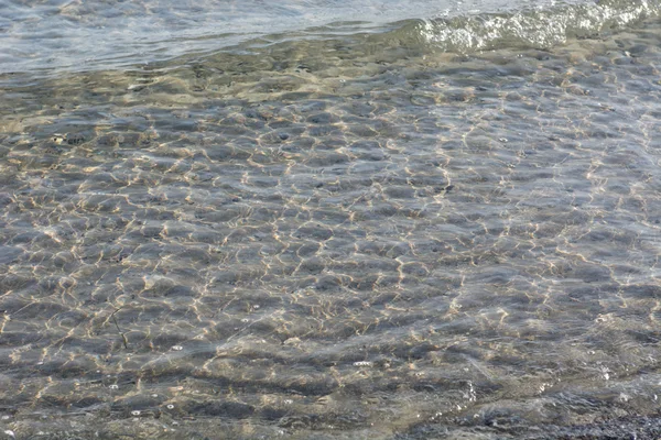 Clear transparent water background with ripples — Stock Photo, Image