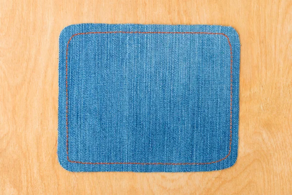 Light frame made of denim — Stock Photo, Image