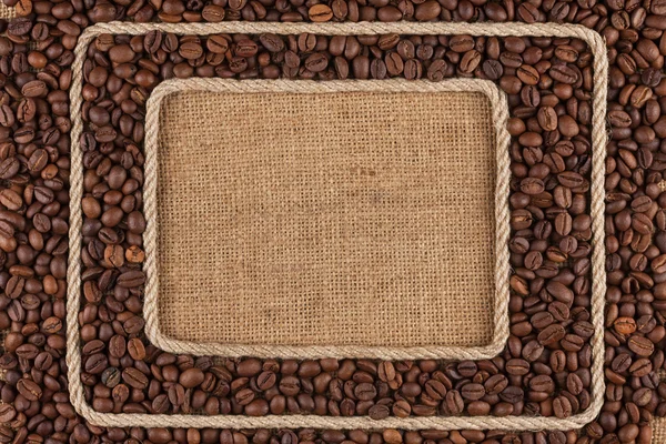 Two frame made of rope with coffee bean on sackcloth — Stock Photo, Image