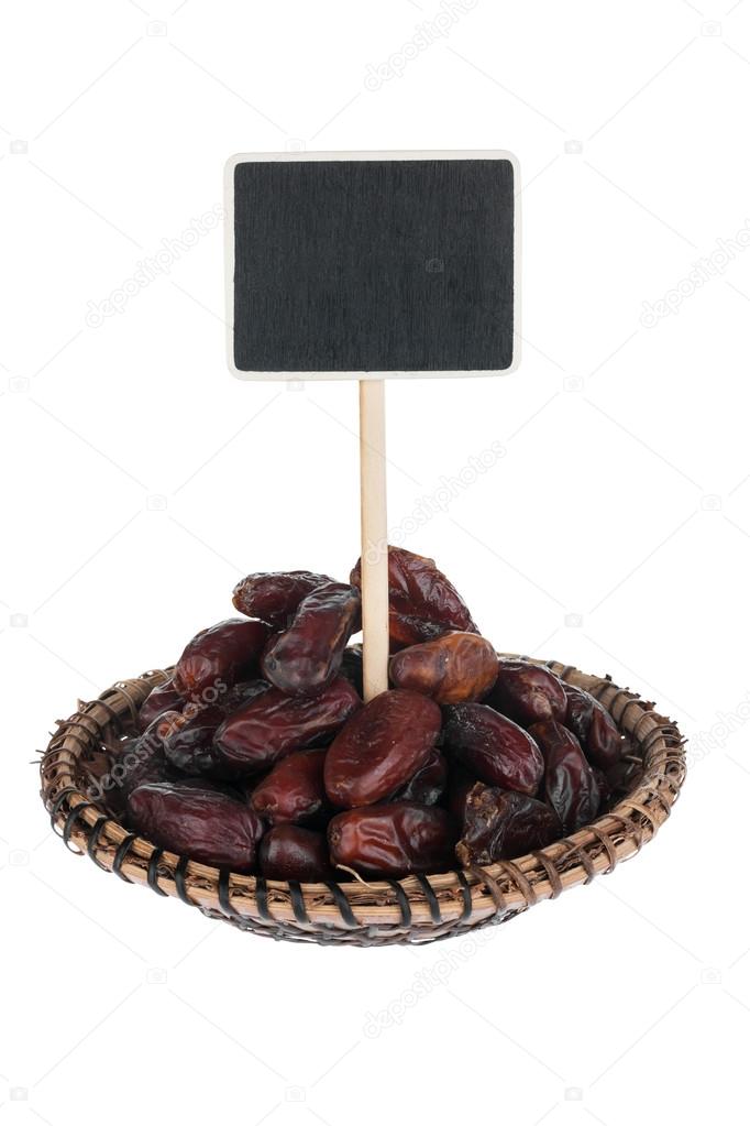 Heap of  date  in a plate, with a pointer for your text