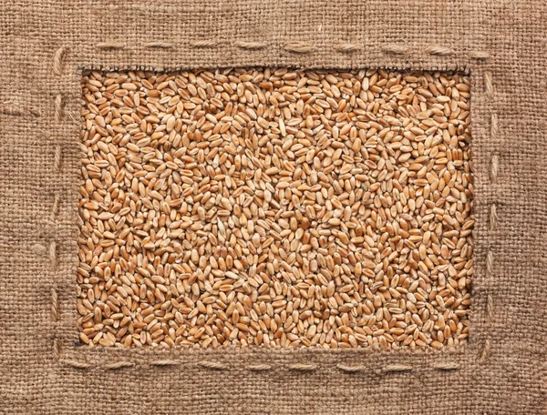 Frame made of burlap with wheat — Stock Photo, Image