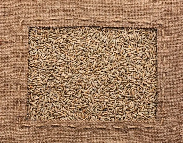 Frame made of burlap with rye — Stock Photo, Image