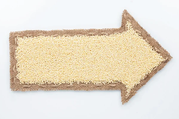 Pointer with millet  grains — Stock Photo, Image