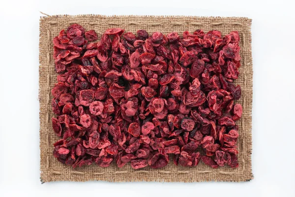 Quadro feito de serapilheira com cranberries secas — Fotografia de Stock