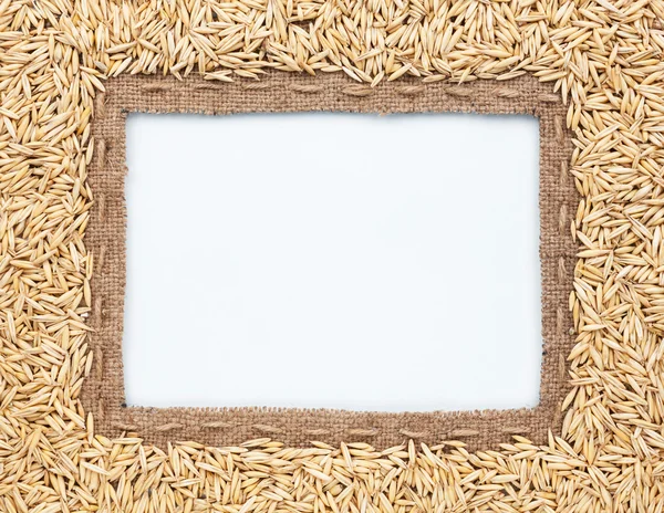 Frame of burlap and  oats  beans — Stock Photo, Image