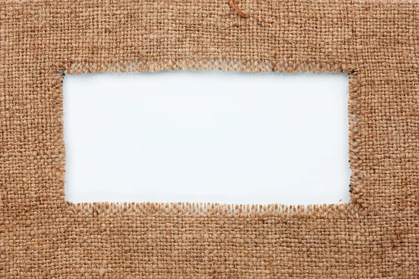 Frame of burlap, lies on a white background — Stock Photo, Image