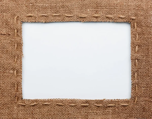 Frame of burlap, lies on a white background — Stock Photo, Image