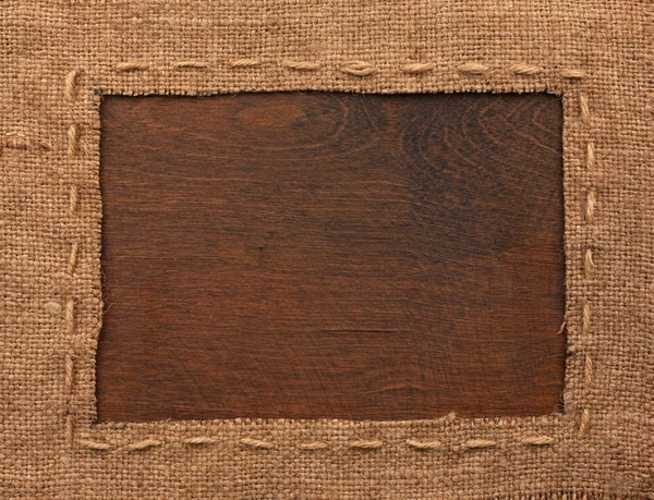 Quadro de serapilheira, encontra-se em um fundo de madeira — Fotografia de Stock