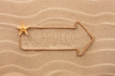 Ok yapılan ip ve deniz kabukları Acapulco sözle 