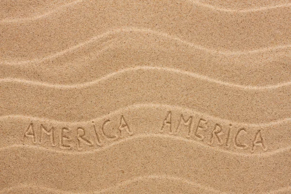 America inscription on the wavy sand — Stock Photo, Image