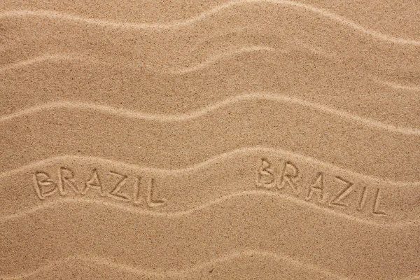 Brazil inscription on the wavy sand — Stock Photo, Image