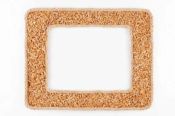 Two frames made of the rope with wheat  grain on a white backgro — Stock Photo, Image