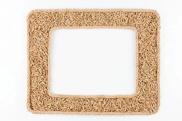 Beyaz bir arka plan üzerinde çavdar tahıl iple yapılmış iki çerçeve — Stok fotoğraf