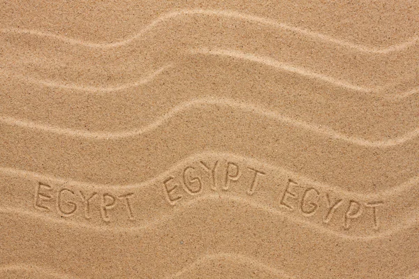 Egypt inscription on the wavy sand — Stock Photo, Image