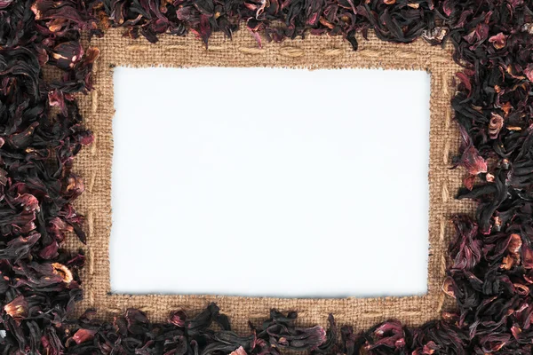 Frame made of burlap with the line and  hibiscus  lies on white — Stock Photo, Image