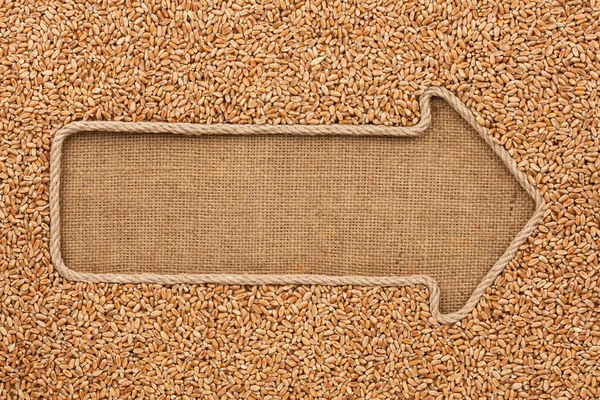 Ukazatel, vyrobené z lana s zrna pšenice na žíně — Stock fotografie
