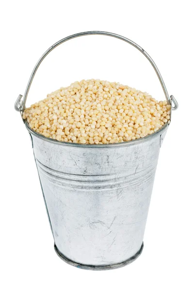 Bucket with millet — Stock Photo, Image