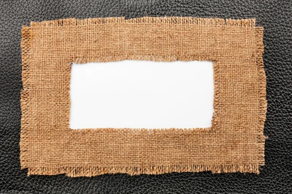 Frame made of burlap with white background lying on the natural — Stock Photo, Image