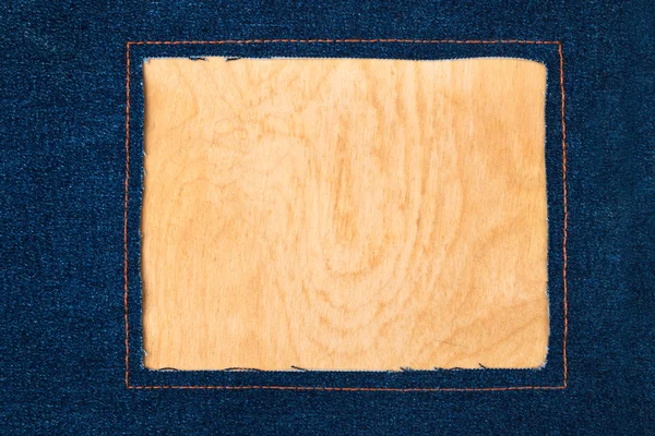 Frame for the text from a dark jeans fabric with the stitched lines of an orange thread — Stock Photo, Image