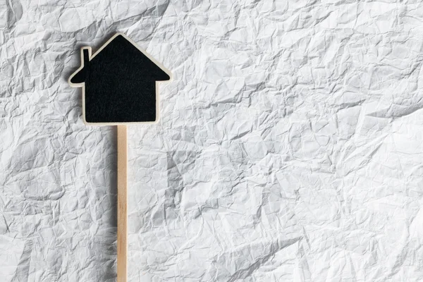 Holzzeiger in der Form eines Hauses — Stockfoto