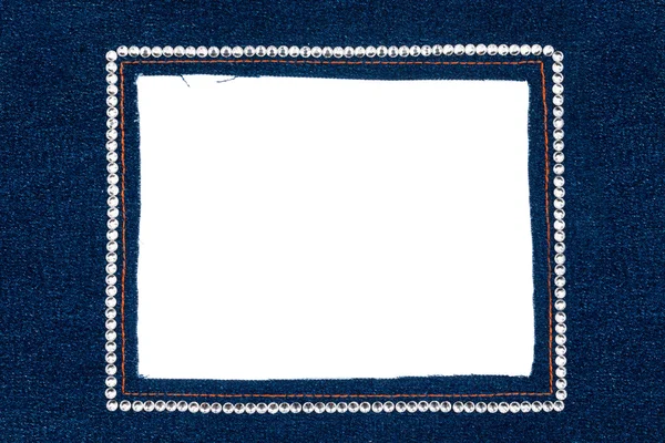 Denim frame with dark jeans with silver rhinestones — Stock Photo, Image