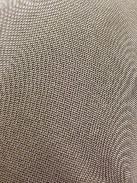 Yumuşak dokuyu ve ince ızgara desenini gösteren ince dokuma kumaşın yakın çekimi