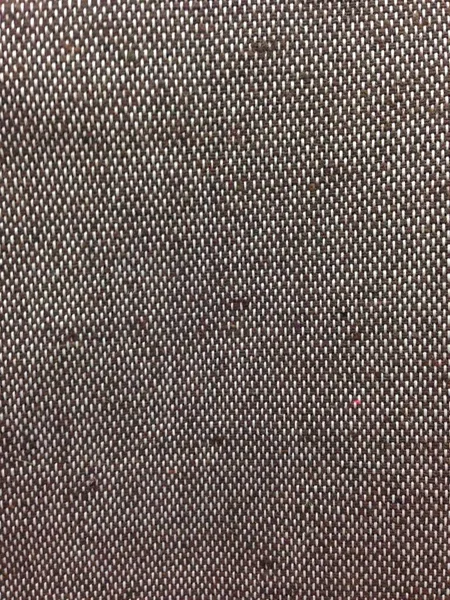 Üstteki kahverengi dokuma kumaş yakın plan ve alttaki düz kahverengi panel