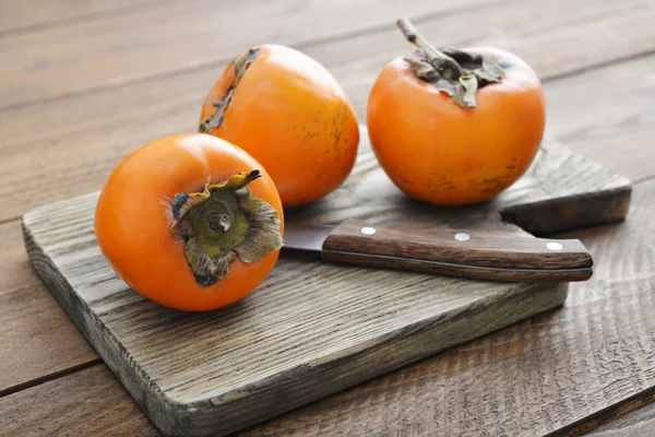 Ripe sweet persimmons — Stock Photo, Image