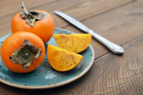 Ripe sweet persimmons — Stock Photo, Image