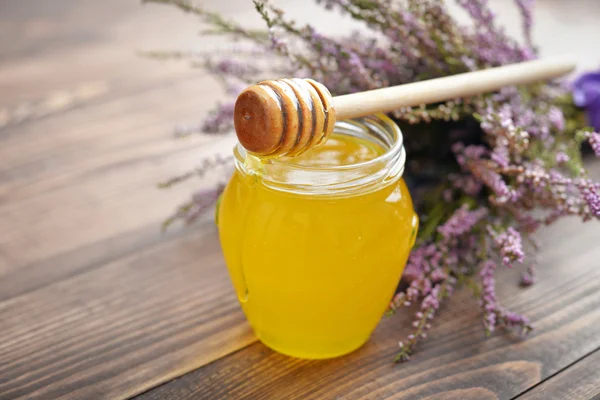 Herbal honey in jar — Stock Photo, Image