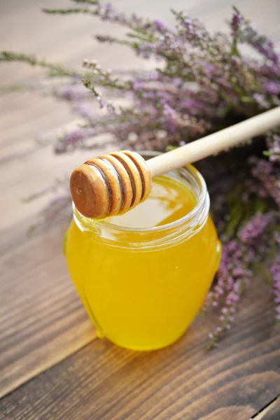 Herbal honey in jar — Stock Photo, Image