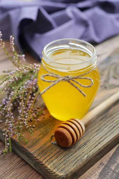 Herbal honey in jar — Stock Photo, Image