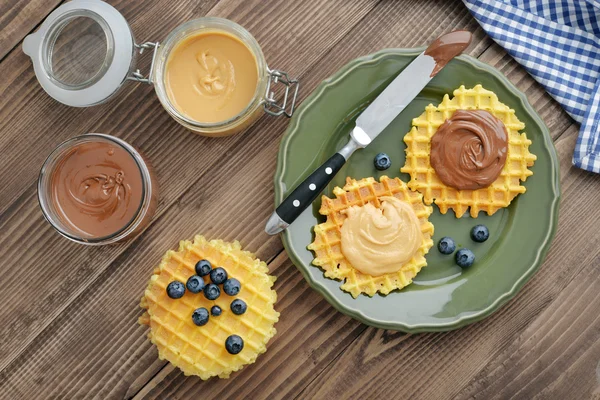 Belgian waffles with chocolate cream and peanut butter — Stock Photo, Image