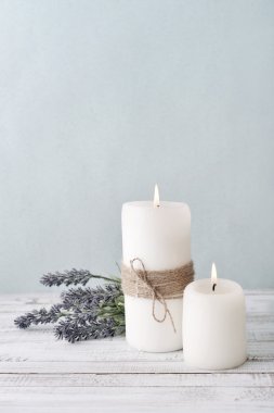 Candles with lavender flowers clipart