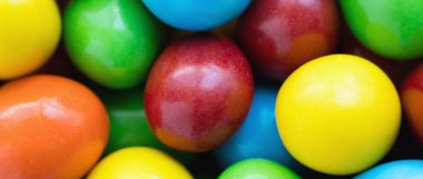 Çeşitli gökkuşağı Choco kaplamalı fıstık renkli arka plan 