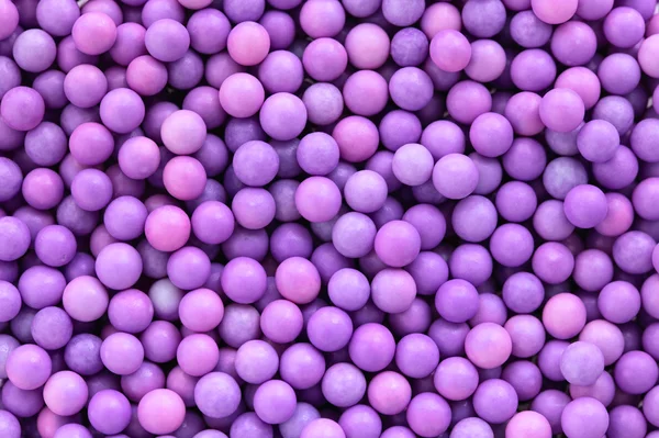 Pink and purple  dragee balls background — Stock Photo, Image