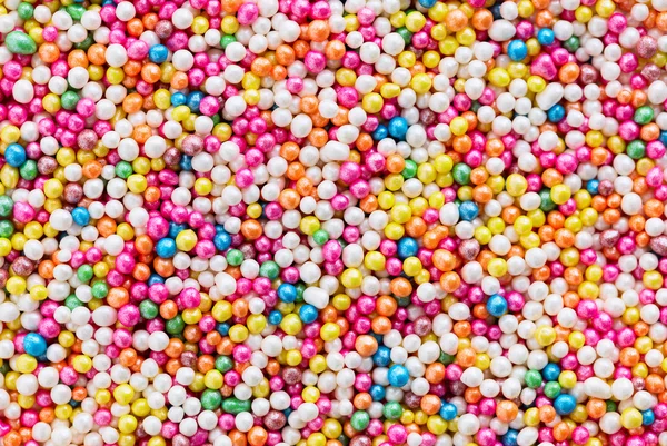 Multicolored  dragee balls background — Stockfoto