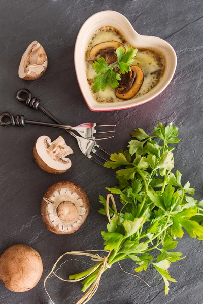 Mushroom casserole in heart shape  with fresh parsley and cheese — Stock Photo, Image