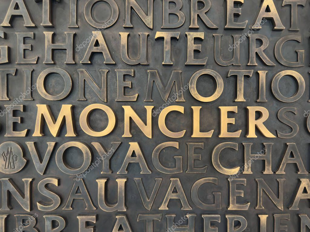 Singapore, Singapore - July 31, 2025 omega store displays a variety of luxury watches in a well-lit space, highlighting an elegant design with glass showcases and red accents.