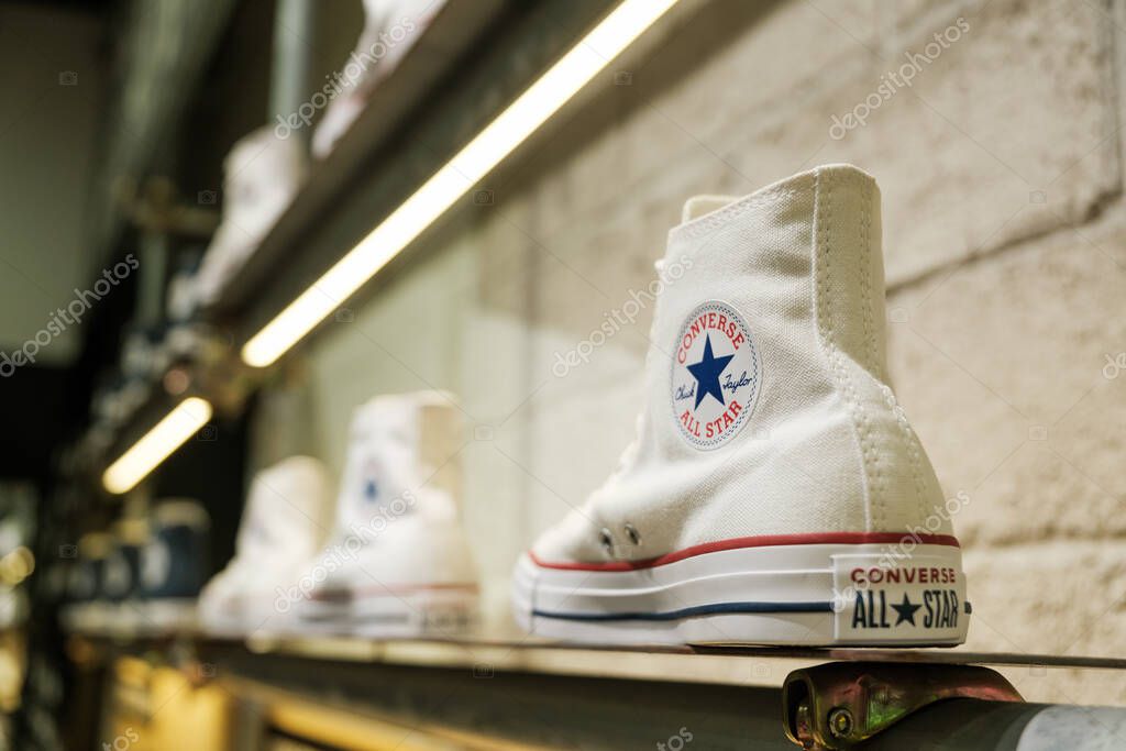 Penang, Malaysia - October 16, 2025 A luxury handbag featuring a golden horse and carriage logo is prominently displayed. The bag is crafted from high-quality leather and showcases elegance.