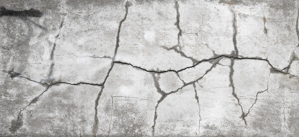 На стене треснула штукатурка. Тонкая текстура
