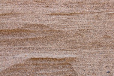 Yaz aylarında bir plajda kum desen closeup