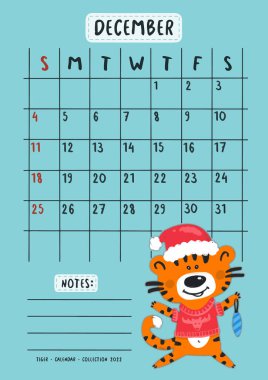 Aralık 2022 için planlama takvimi. Sıcak kırmızı kazaklı, Noel ağacı oyuncaklı şirin bir kaplan yavrusu..