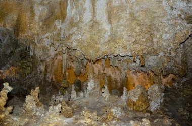 Calcite inlets, stalactites and stalagmites in large underground halls in Carlsbad Caverns National Park, New Mexico. USA clipart