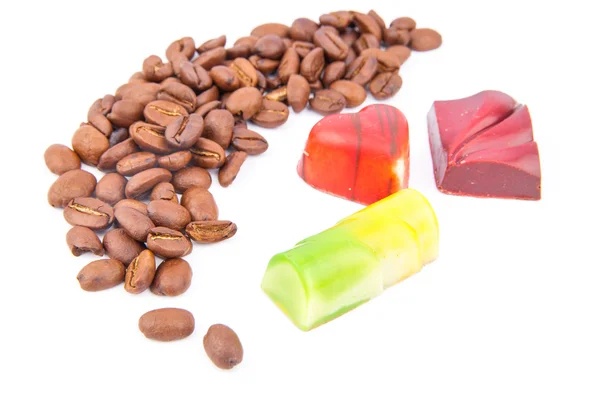 Coffee beans and candies — Stock Photo, Image