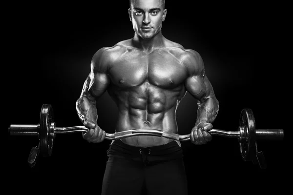 Bodybuilder workout with barbell — Stock Photo, Image