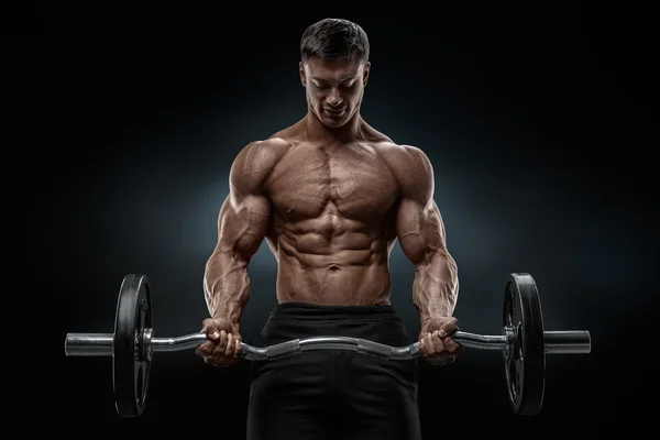 Gros plan portrait d'un homme musclé séance d'entraînement avec haltère à la salle de gym — Photo